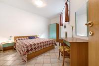 A bed or beds in a room at Rustico Spagnol 3