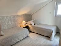 Posteľ alebo postele v izbe v ubytovaní Apartment Simply The Best