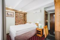 Posteľ alebo postele v izbe v ubytovaní Hotel Solaris