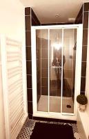 a shower with a glass door in a bathroom at EL DREAM - WiFi NetFlix Centre-ville in Lisieux