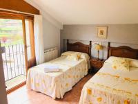 Posteľ alebo postele v izbe v ubytovaní HOSTAL JJ salduero