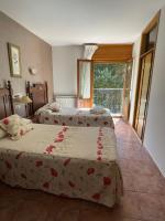 Posteľ alebo postele v izbe v ubytovaní HOSTAL JJ salduero
