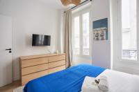Posteľ alebo postele v izbe v ubytovaní Duplex Center of Paris by Studio prestige