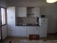 Kuchyňa alebo kuchynka v ubytovaní Apartments Milo