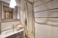a bathroom with a shower and a sink at Studio cabine Le Charvet in Le Grand-Bornand