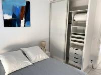 Posteľ alebo postele v izbe v ubytovaní Bel Appartement en front de mer -Palavas les Flots