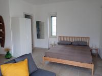 Postel nebo postele na pokoji v ubytování Casa a Piano Piccolo