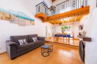 Posedenie v ubytovaní Villa SaCalma con Piscina Privada