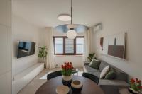 Televízia a/alebo spoločenská miestnosť v ubytovaní Apartman Baredine