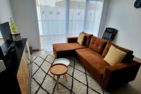 Część wypoczynkowa w obiekcie Appartement avec balcon/terrasse