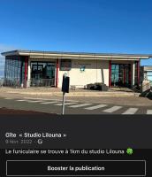 a building on the side of a street at Studio Lilouna avec parking privé in Le Tréport