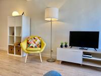 A television and/or entertainment centre at Xuloss Apartments 2