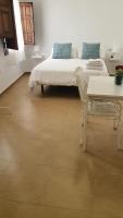Posteľ alebo postele v izbe v ubytovaní CASA MORENA MiA APARTAMENTOS