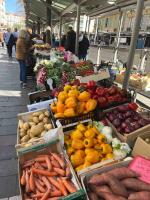 a market with lots of fruits and vegetables in boxes at Appartement atypique et original in Nice