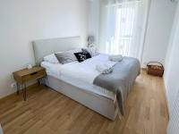 Łóżko lub łóżka w pokoju w obiekcie POMPIDOU - 2 Chambres avec piscine, parking, Tennis, Juan