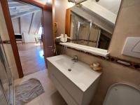 Kúpeľňa v ubytovaní Studio Apartments Baia Azzurra 7