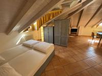 Posteľ alebo postele v izbe v ubytovaní Studio Apartments Baia Azzurra 7