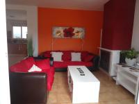 Posezení v ubytování LAS PALOMAS, appartement 3 chambres avec piscine