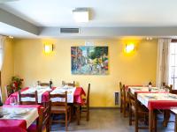 En restaurant eller et andet spisested på Hostal Ainoa