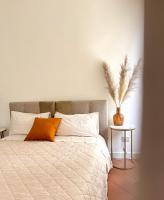 A bed or beds in a room at Il Cantuccio di Gioia