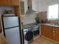 Kuchyň nebo kuchyňský kout v ubytování LAS PALOMAS, appartement 3 chambres avec piscine