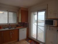 Kuchyň nebo kuchyňský kout v ubytování LAS PALOMAS, appartement 3 chambres avec piscine