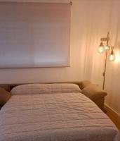 Posteľ alebo postele v izbe v ubytovaní Apartamento de Julia