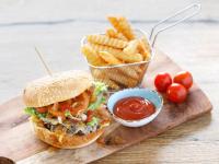 a sandwich and french fries and a basket of ketchup at JetPark Hotel Rotorua in Rotorua