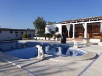 Bazén v ubytovaní CASA RURAL SITIO DE CASA NUEVA alebo v jeho blízkosti