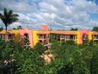a group of buildings with trees in front of them at Ecotel Quinta Regia in Valladolid
