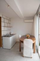 Kuchyň nebo kuchyňský kout v ubytování Apartments Kiki