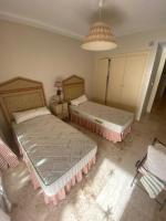 Postel nebo postele na pokoji v ubytování Apartamento guadalmina