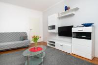 Televízia a/alebo spoločenská miestnosť v ubytovaní Apartment KATA