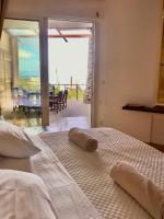 Posteľ alebo postele v izbe v ubytovaní KLIDON Dreamy Living Suites
