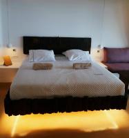Posteľ alebo postele v izbe v ubytovaní KLIDON Dreamy Living Suites