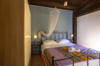 Posteľ alebo postele v izbe v ubytovaní Villa a Marsala con piscina