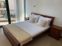 Postel nebo postele na pokoji v ubytování Port Balchik apartment