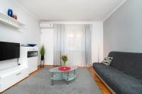 Televízia a/alebo spoločenská miestnosť v ubytovaní Apartment KATA