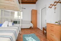 Postel nebo postele na pokoji v ubytování Seaside House in Ravdouha