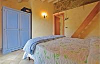 A bed or beds in a room at Casa Montesole