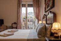 Posteľ alebo postele v izbe v ubytovaní B&B I FILOKSENIA