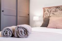 Postel nebo postele na pokoji v ubytování Sur Suites Palmeras 8