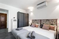 Postel nebo postele na pokoji v ubytování Sur Suites Palmeras 8