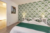 Katil atau katil-katil dalam bilik di Appartement la Toscanelle - Quartier historique - Gaillac