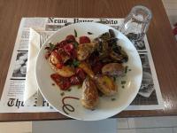 een bord met eten met vlees en groenten op een tafel bij Campanile Evry Ouest - Corbeil Essonnes in Corbeil-Essonnes