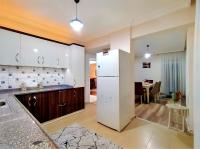 Een keuken of kitchenette bij Spacious and Cozy Apartment in Muratpasa Antalya