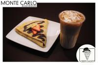 um prato com pastelaria e uma bebida na mesa em Monte Carlo Boardwalk / Oceanfront Ocean City em Ocean City