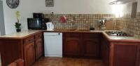 Kuchyňa alebo kuchynka v ubytovaní Maison de campagne au cœur d'un élevage de poneys connemara