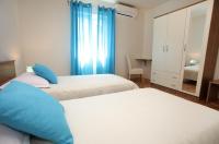 Postel nebo postele na pokoji v ubytování Apartment Biočić