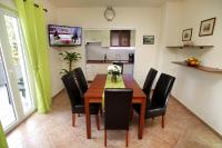 Kuchyň nebo kuchyňský kout v ubytování Apartment Biočić